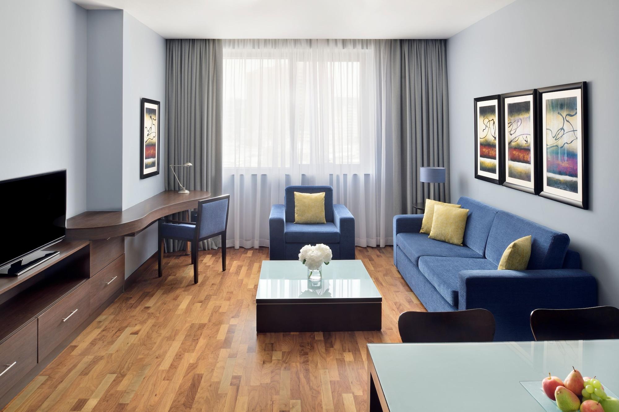 Moevenpick Hotel Apartments Al Mamzar Ντουμπάι Εξωτερικό φωτογραφία A typical living room