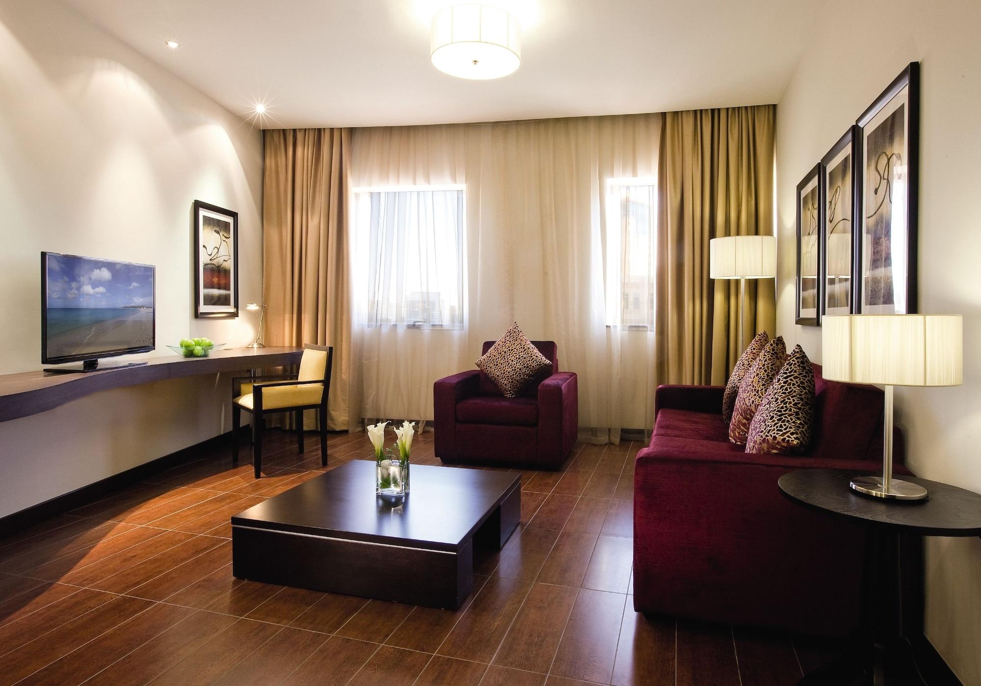 Moevenpick Hotel Apartments Al Mamzar Ντουμπάι Εξωτερικό φωτογραφία Living room