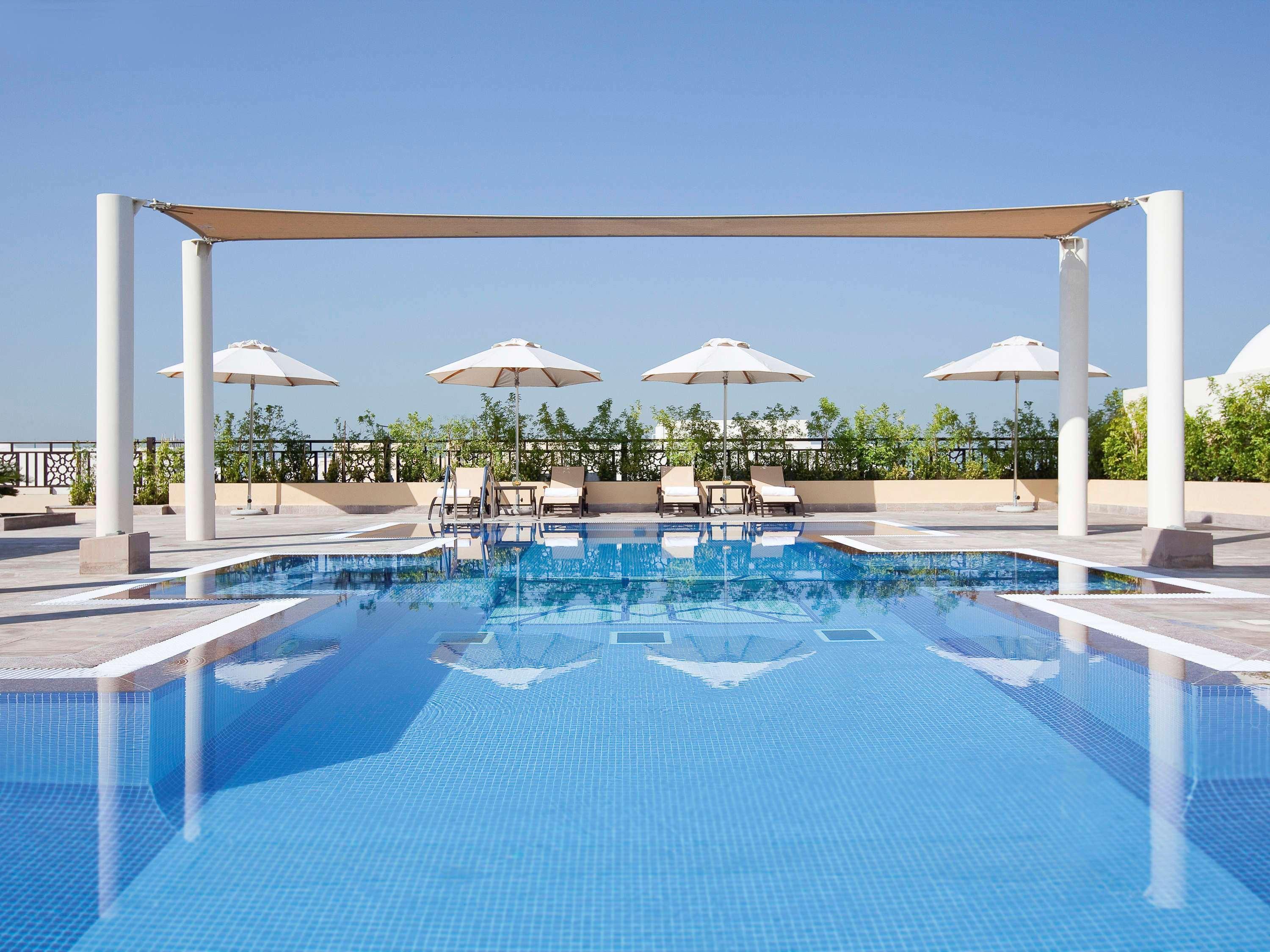 Moevenpick Hotel Apartments Al Mamzar Ντουμπάι Εξωτερικό φωτογραφία Rooftop pool at the hotel