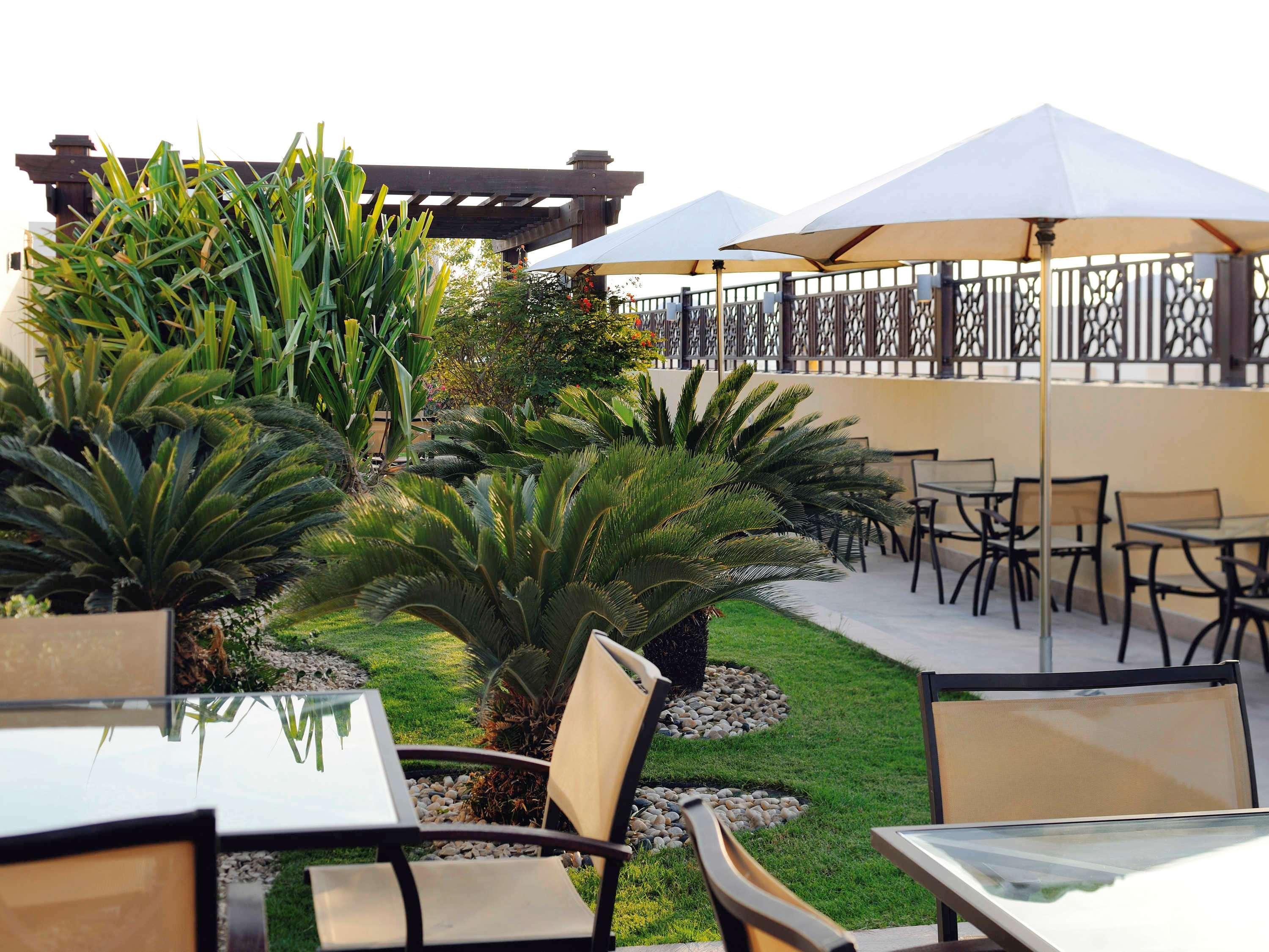 Moevenpick Hotel Apartments Al Mamzar Ντουμπάι Εξωτερικό φωτογραφία The rooftop garden at the hotel