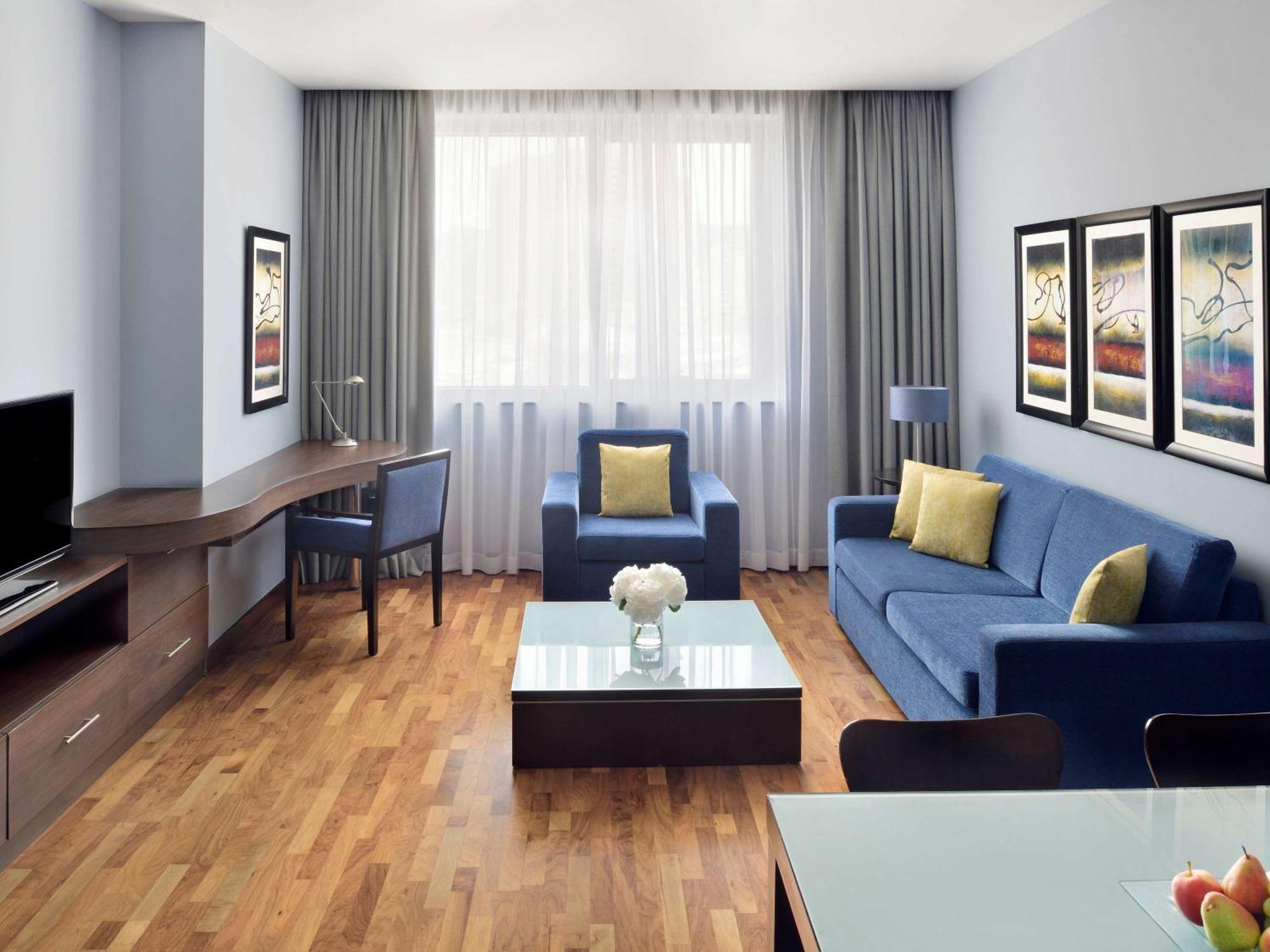 Moevenpick Hotel Apartments Al Mamzar Ντουμπάι Εξωτερικό φωτογραφία A living room